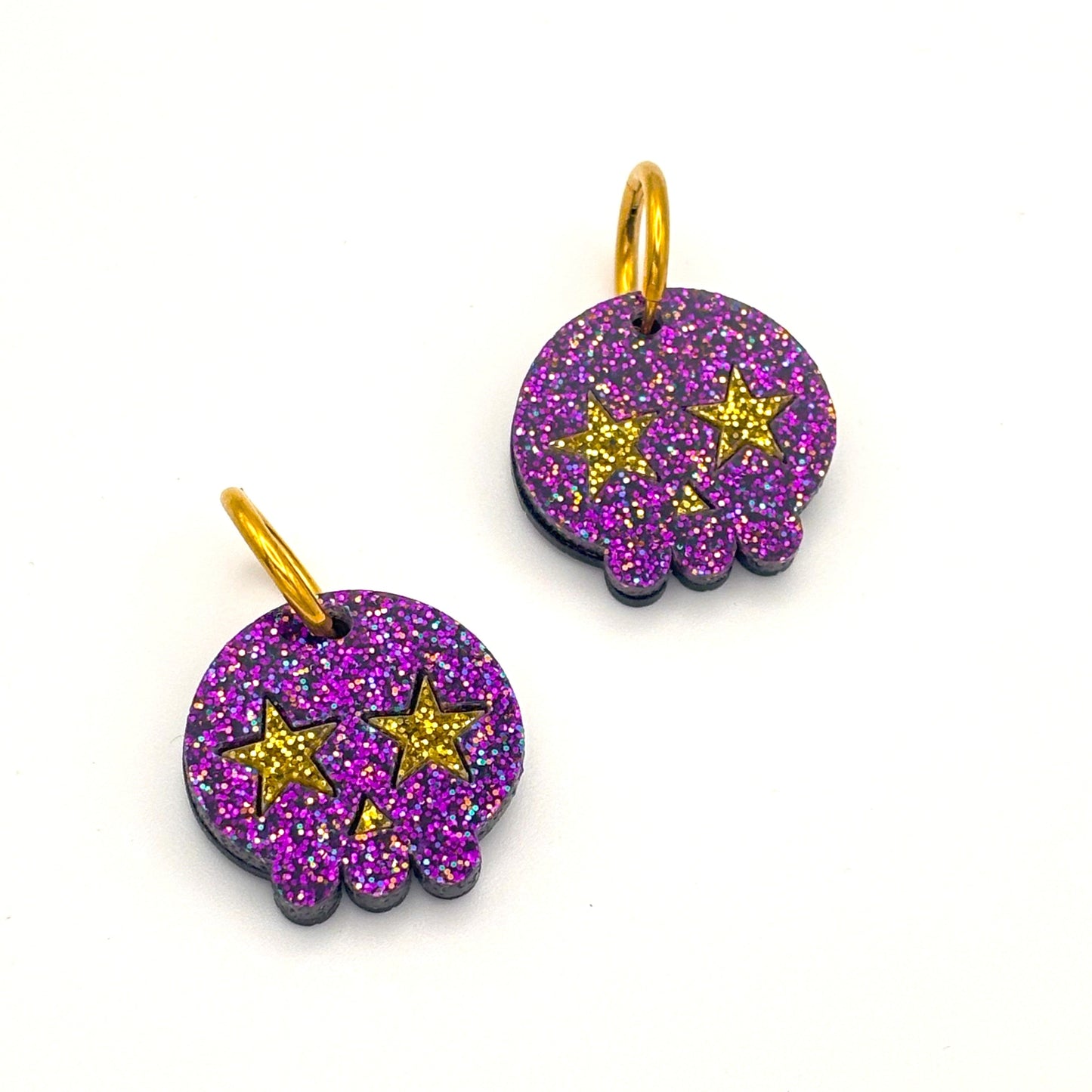 Pendientes de Calavera Kawai purpurina